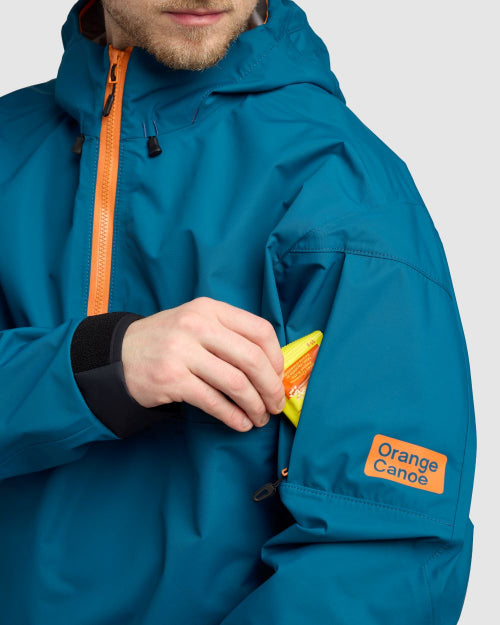 Person slipping a snack into a zippered bicep pocket